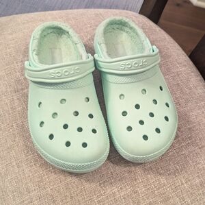 Mint green lined Crocs - size W8/M6